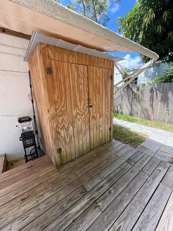 a view of a backyard of the house