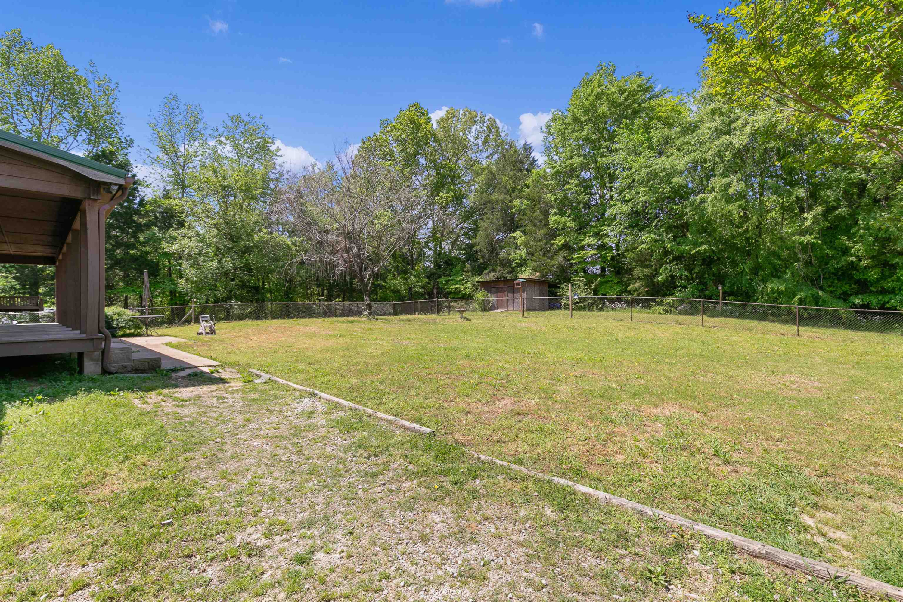 475 Liberty Claybrook Road Beech Bluff, TN 38313 - Photo 3 of 18 a view of a swimming pool and a yard