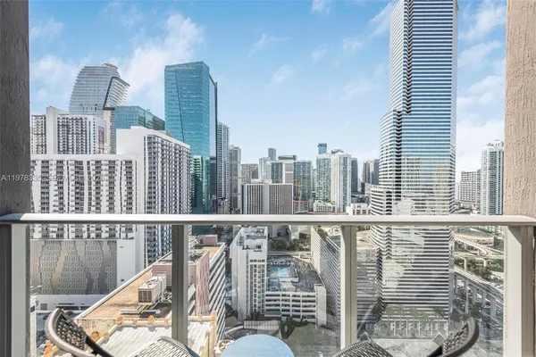 a balcony with a city view