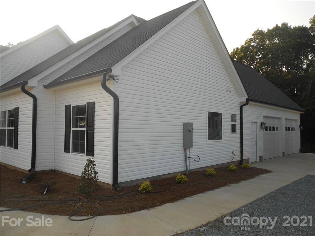 2309 New Salem Road Monroe, NC 28110 - Photo 3 of 26 a view of a white house