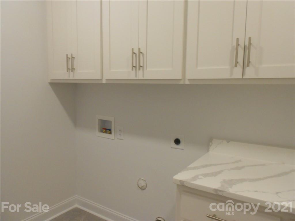 2309 New Salem Road Monroe, NC 28110 - Photo 25 of 26 a view of white cabinets