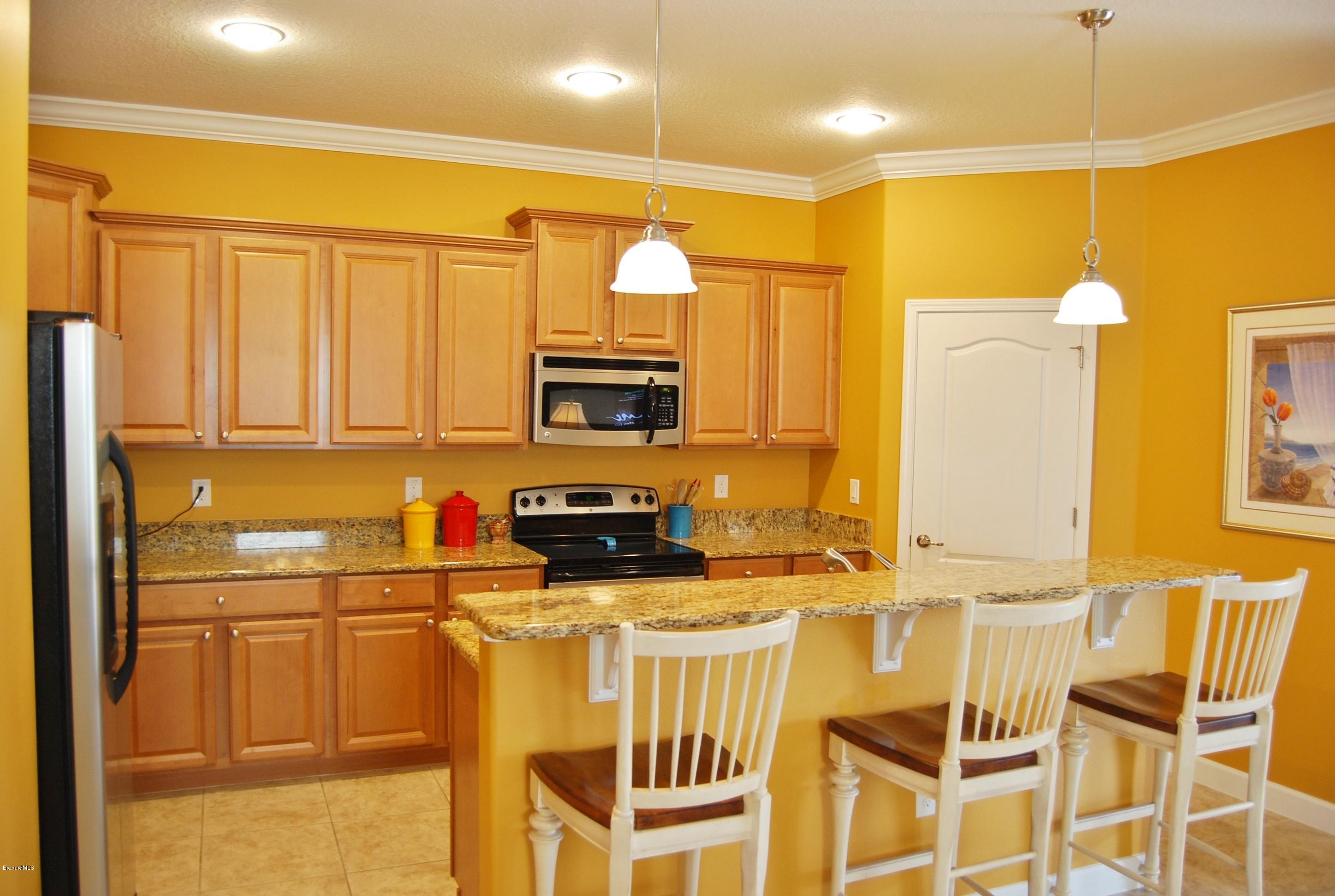 3479 Ahern Place Melbourne, FL 32940 - Photo 4 of 19 Breakfast bar for great conversation