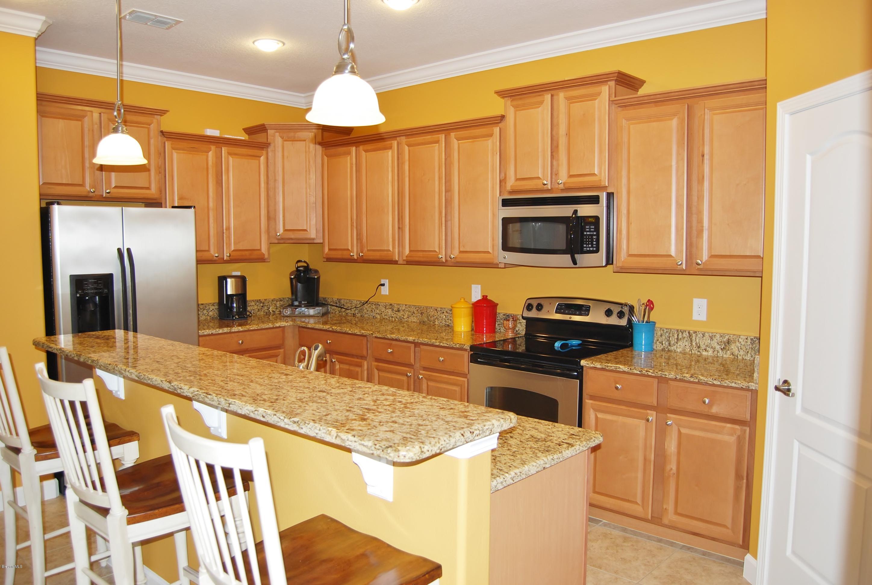 3479 Ahern Place Melbourne, FL 32940 - Photo 5 of 19 Open kitchen with walk-in pantry