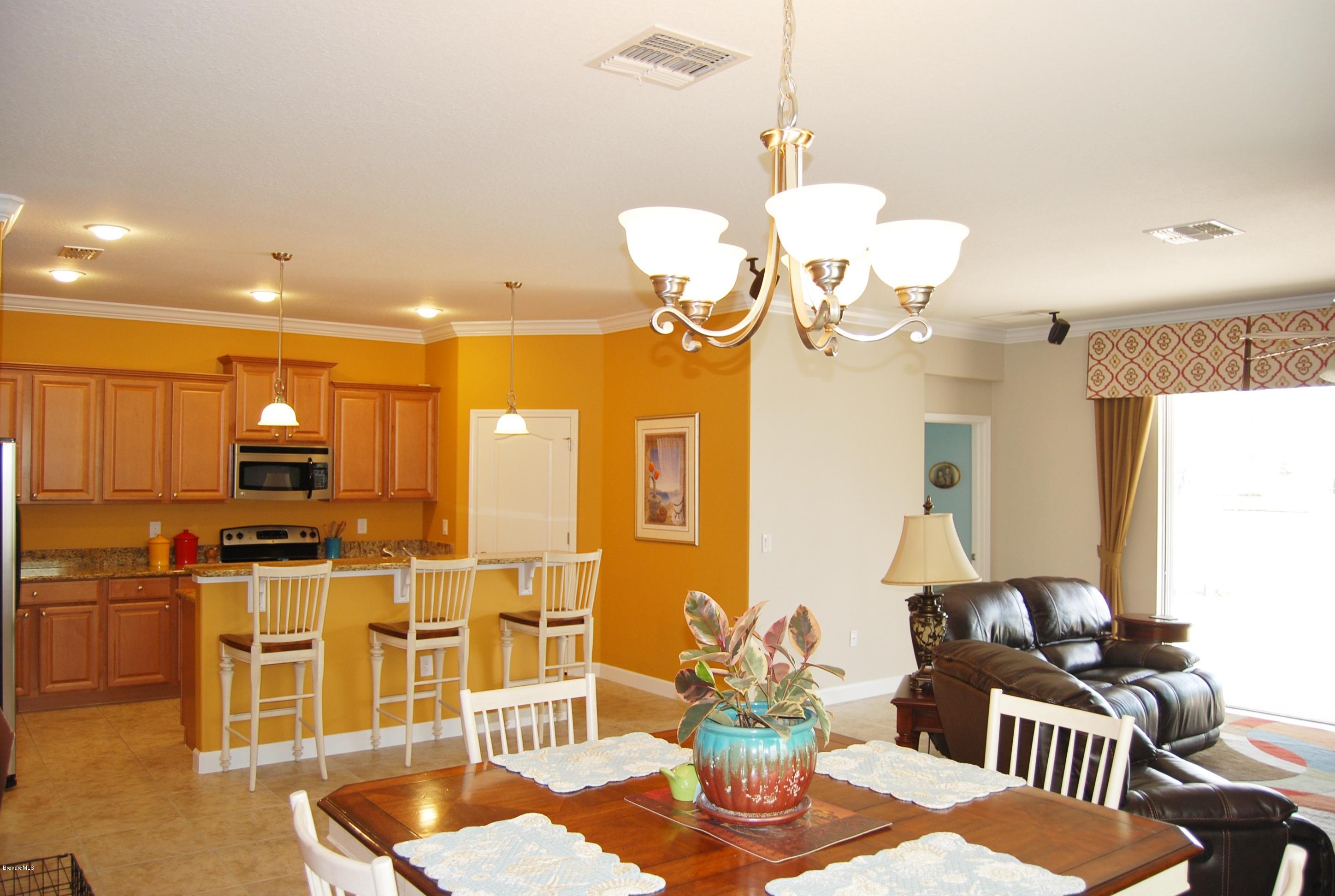 3479 Ahern Place Melbourne, FL 32940 - Photo 6 of 19 Lake view from great room