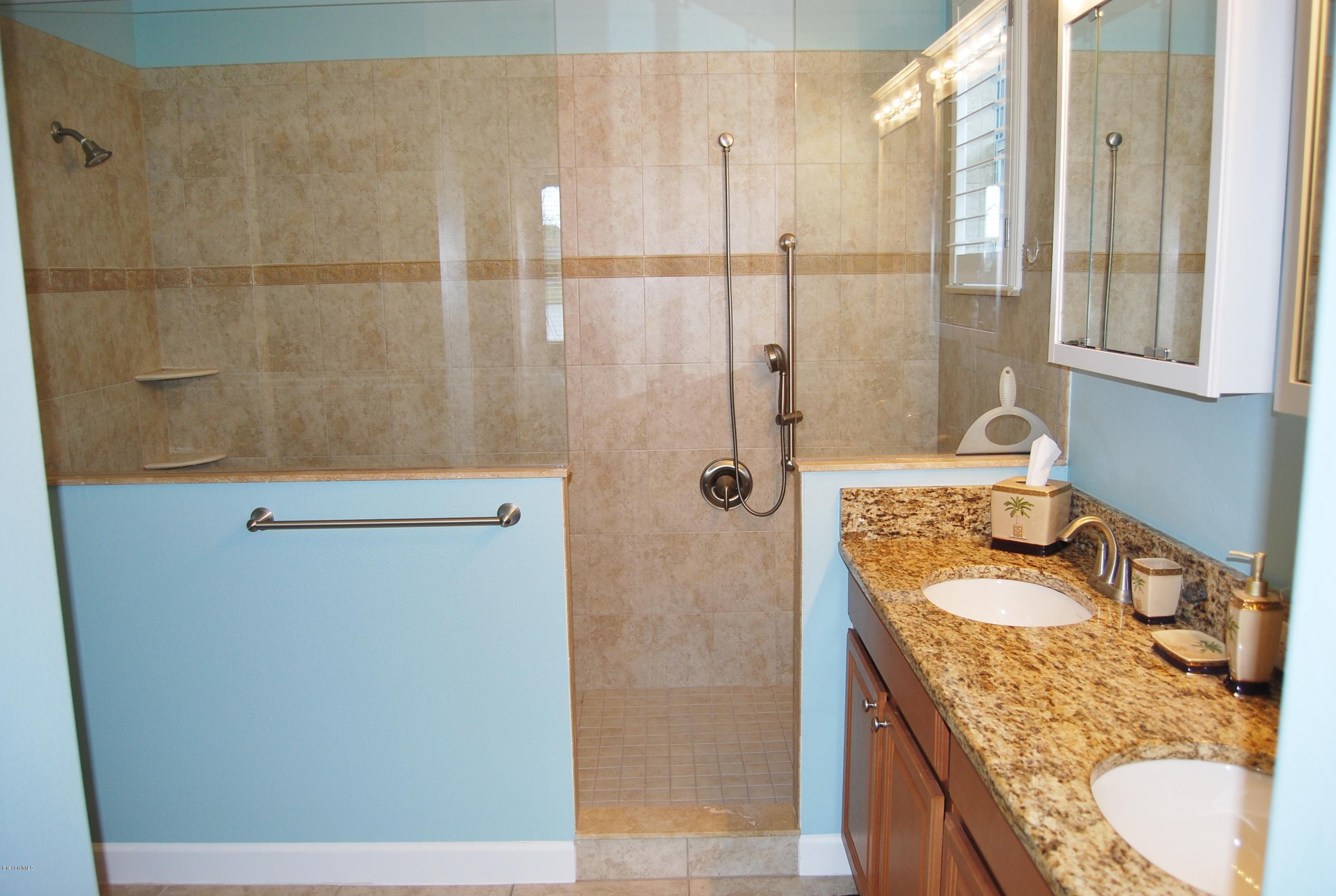 3479 Ahern Place Melbourne, FL 32940 - Photo 10 of 19 Master bath & walk-in shower
