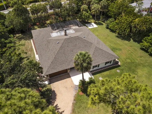 a view of outdoor space with garden and trees