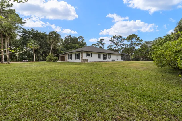 an aerial view of city and lake