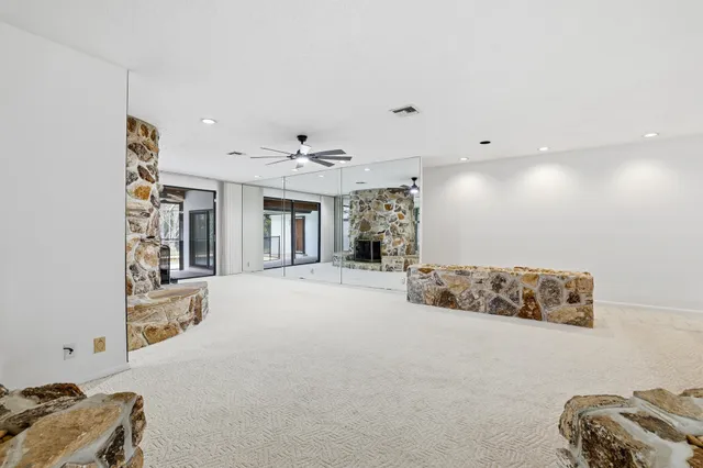 a view of a livingroom with furniture