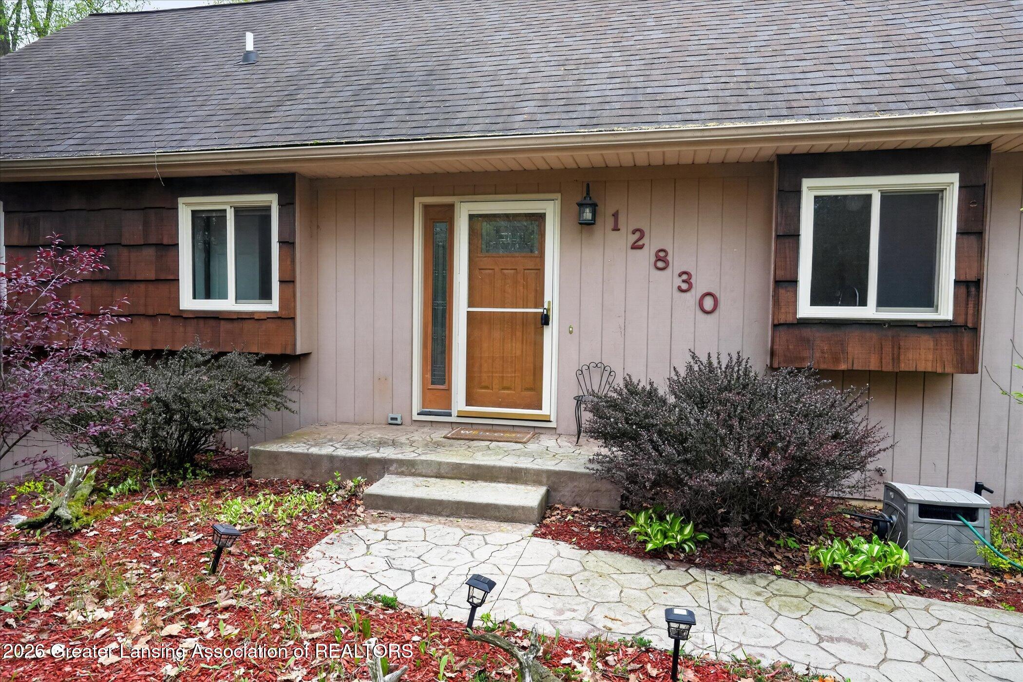 12830 Upton Road Bath, MI 48808 - Photo 4 of 38 Front Door