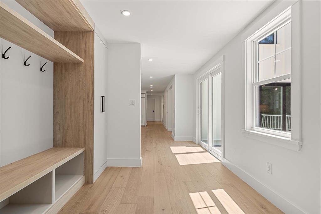 14 Ruel Drive Dover, MA 02030 - Photo 16 of 41 a view of livingroom with hardwood floor and a ceiling fan