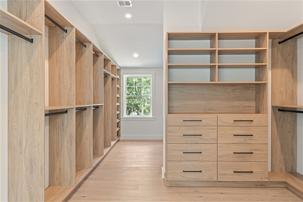 14 Ruel Drive Dover, MA 02030 - Photo 25 of 41 a view of walk in closet with empty racks