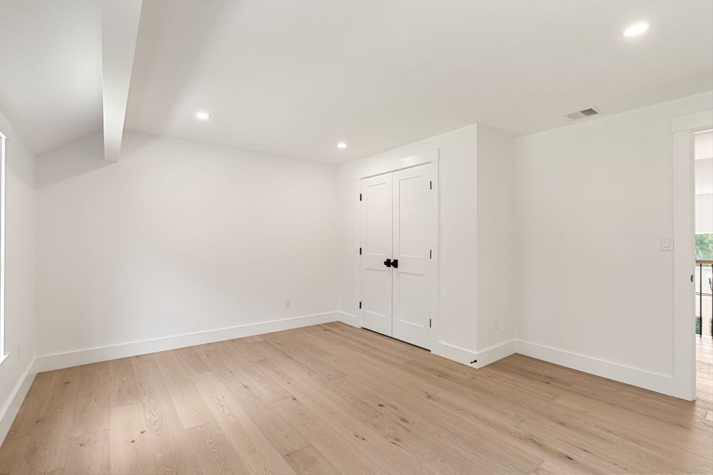 14 Ruel Drive Dover, MA 02030 - Photo 28 of 41 a view of room with wooden floor and white walls