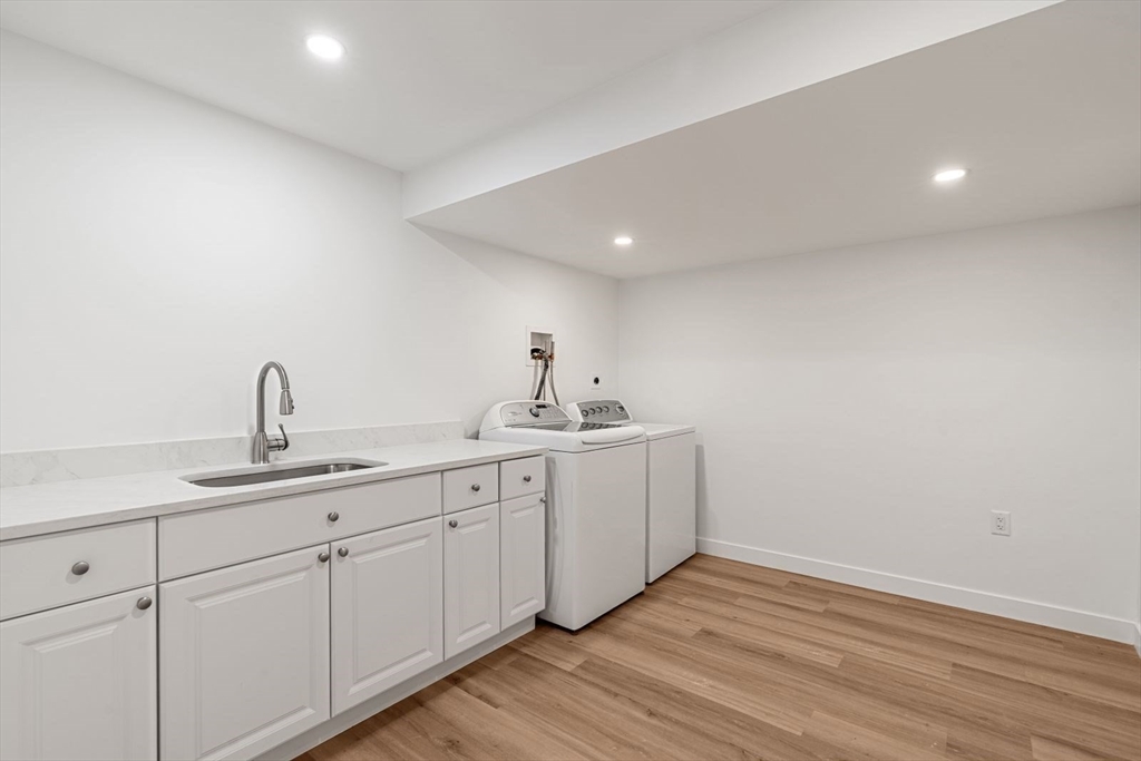 14 Ruel Drive Dover, MA 02030 - Photo 33 of 41 a kitchen with sink and mirror