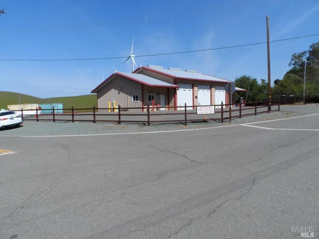 a view of a building with a street