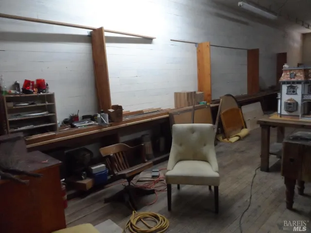 a livingroom with dining area and a couch