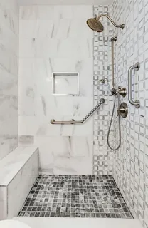 a bathroom with a sink vanity and a mirror