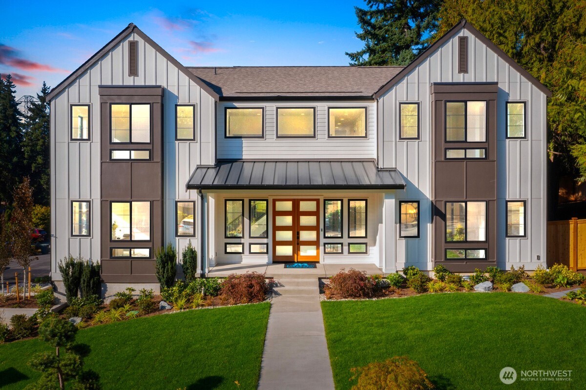 308 124th Place Northeast Bellevue, WA 98005 - Photo 1 of 39 a front view of a house with a yard