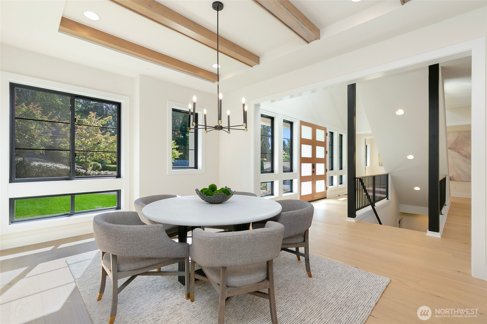 308 124th Place Northeast Bellevue, WA 98005 - Photo 13 of 39 a view of a dining room with furniture window and wooden floor
