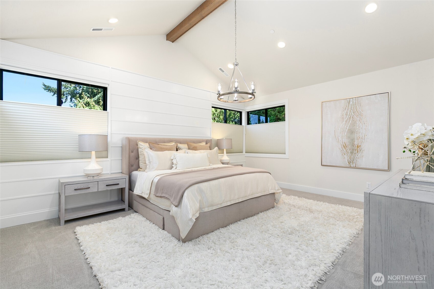 308 124th Place Northeast Bellevue, WA 98005 - Photo 16 of 39 a bedroom with a bed chandelier and a window