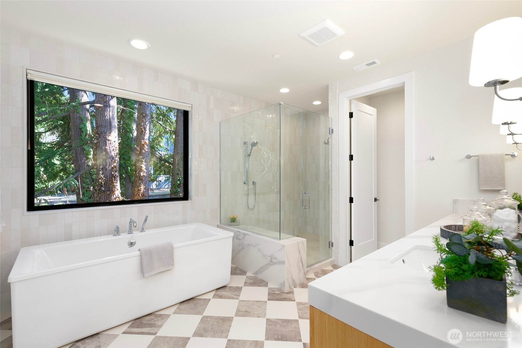 308 124th Place Northeast Bellevue, WA 98005 - Photo 17 of 39 a spacious bathroom with a bathtub and a sink