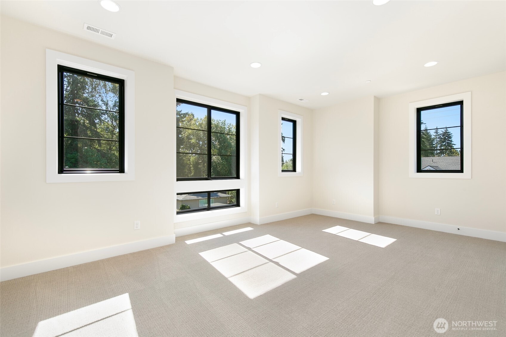 308 124th Place Northeast Bellevue, WA 98005 - Photo 20 of 39 an empty room with windows