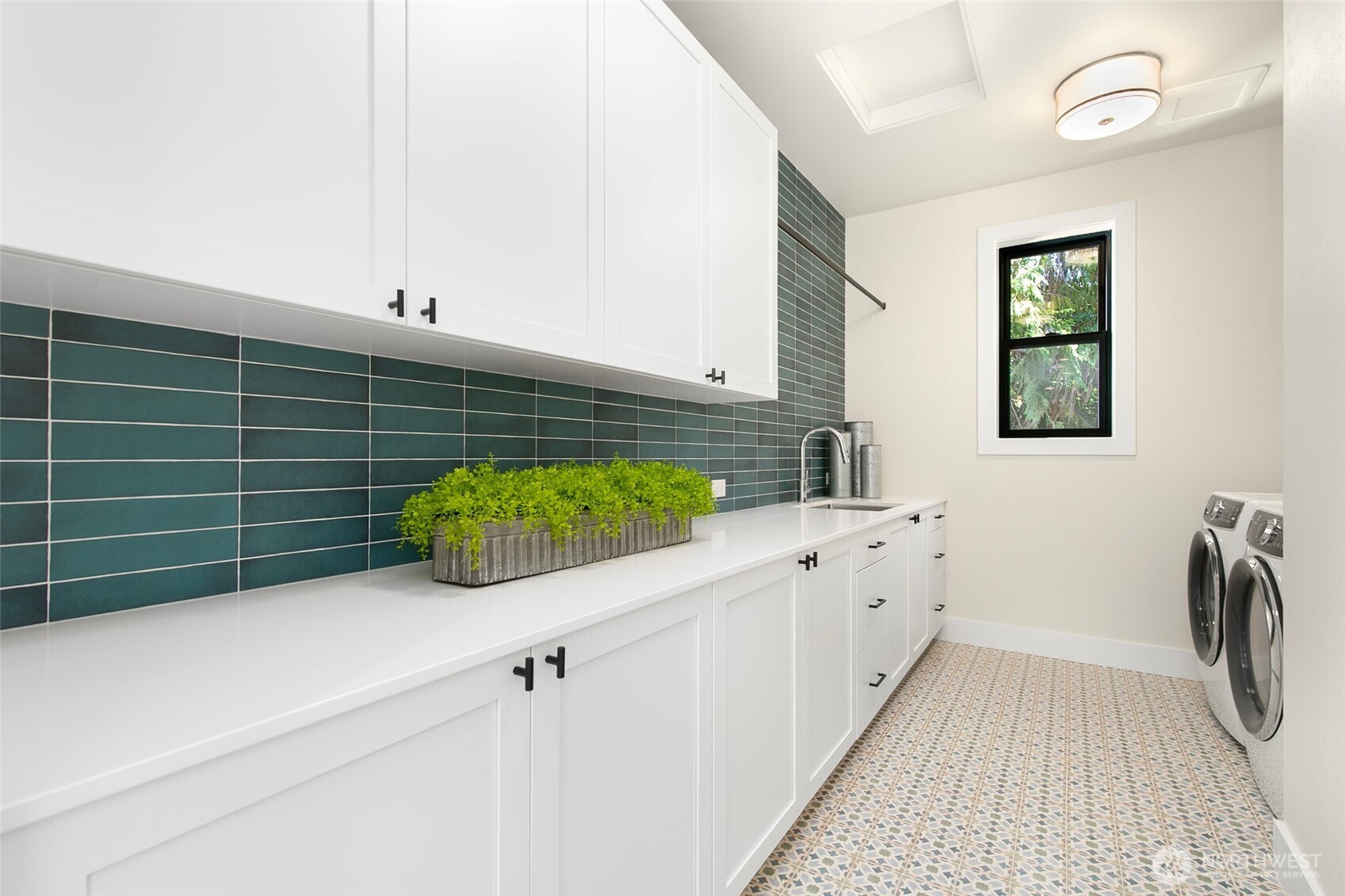 308 124th Place Northeast Bellevue, WA 98005 - Photo 24 of 39 a bathroom with a sink a mirror and shower