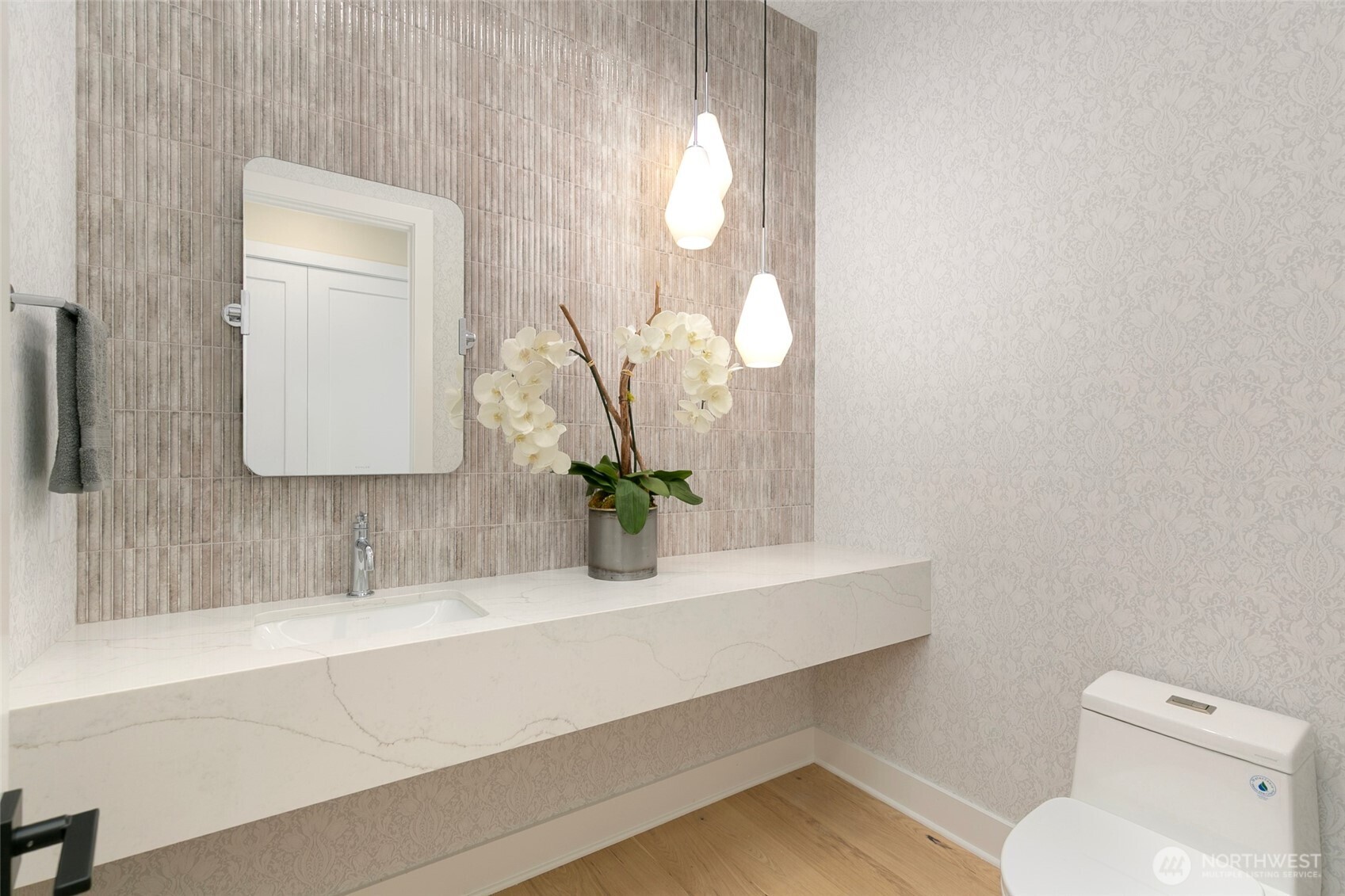 308 124th Place Northeast Bellevue, WA 98005 - Photo 30 of 39 a bathroom with a toilet a sink and mirror