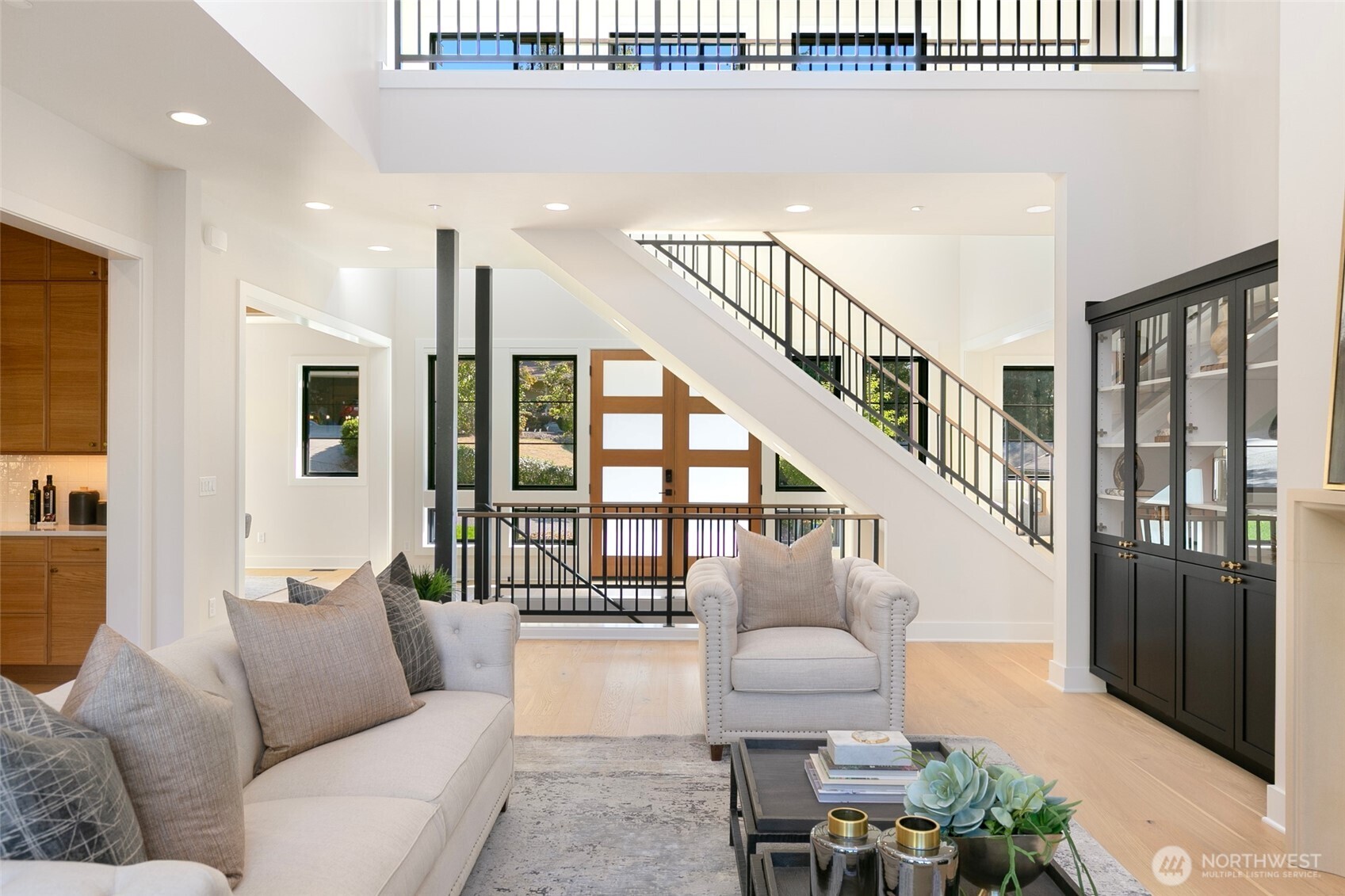 308 124th Place Northeast Bellevue, WA 98005 - Photo 7 of 39 a living room with furniture and a table