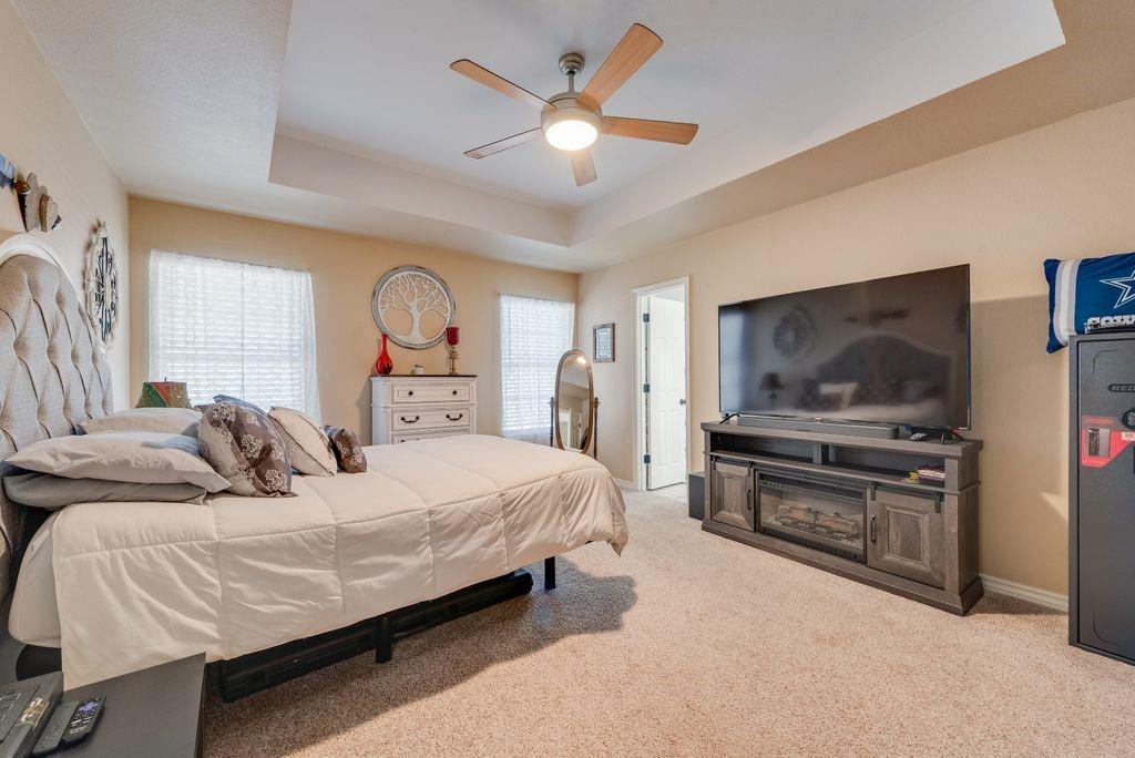 579 South Hitt Street Boyd, TX 76023 - Photo 22 of 34 Large Primary Bedroom with tray ceiling