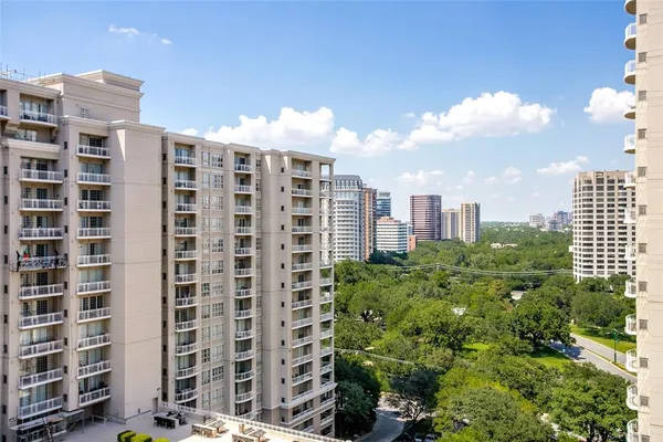 a city view with tall buildings