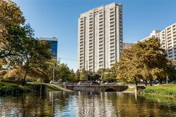 a view of swimming pool with outdoor space and lake view