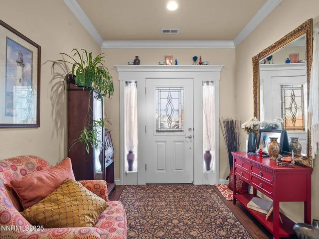 a view of a livingroom with furniture and window