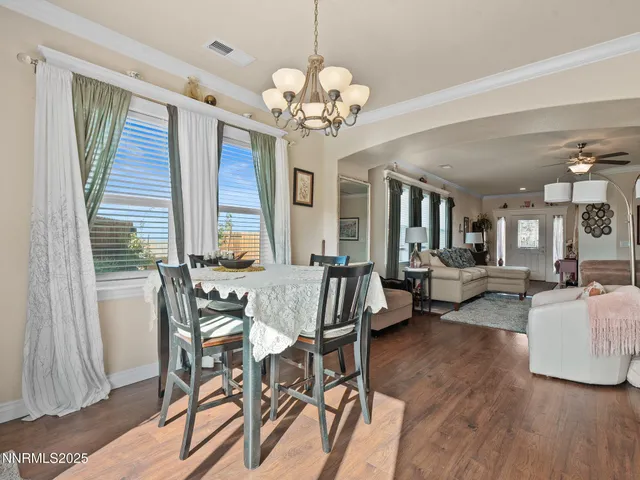 a kitchen with a sink stove top oven and cabinets