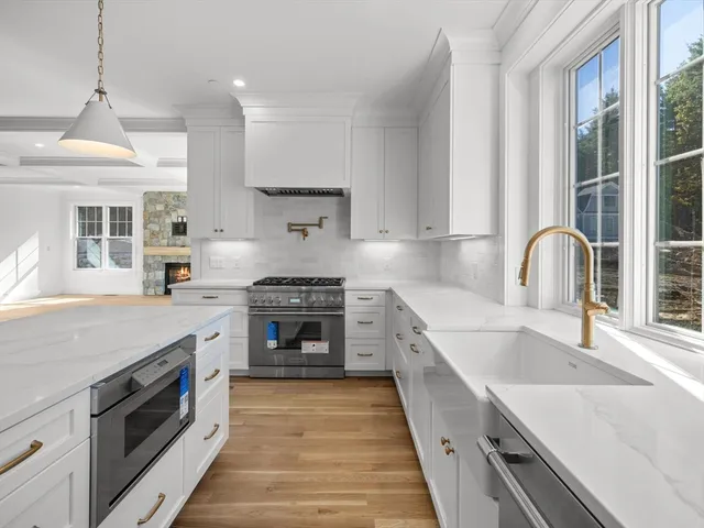 a kitchen with a stove and a sink