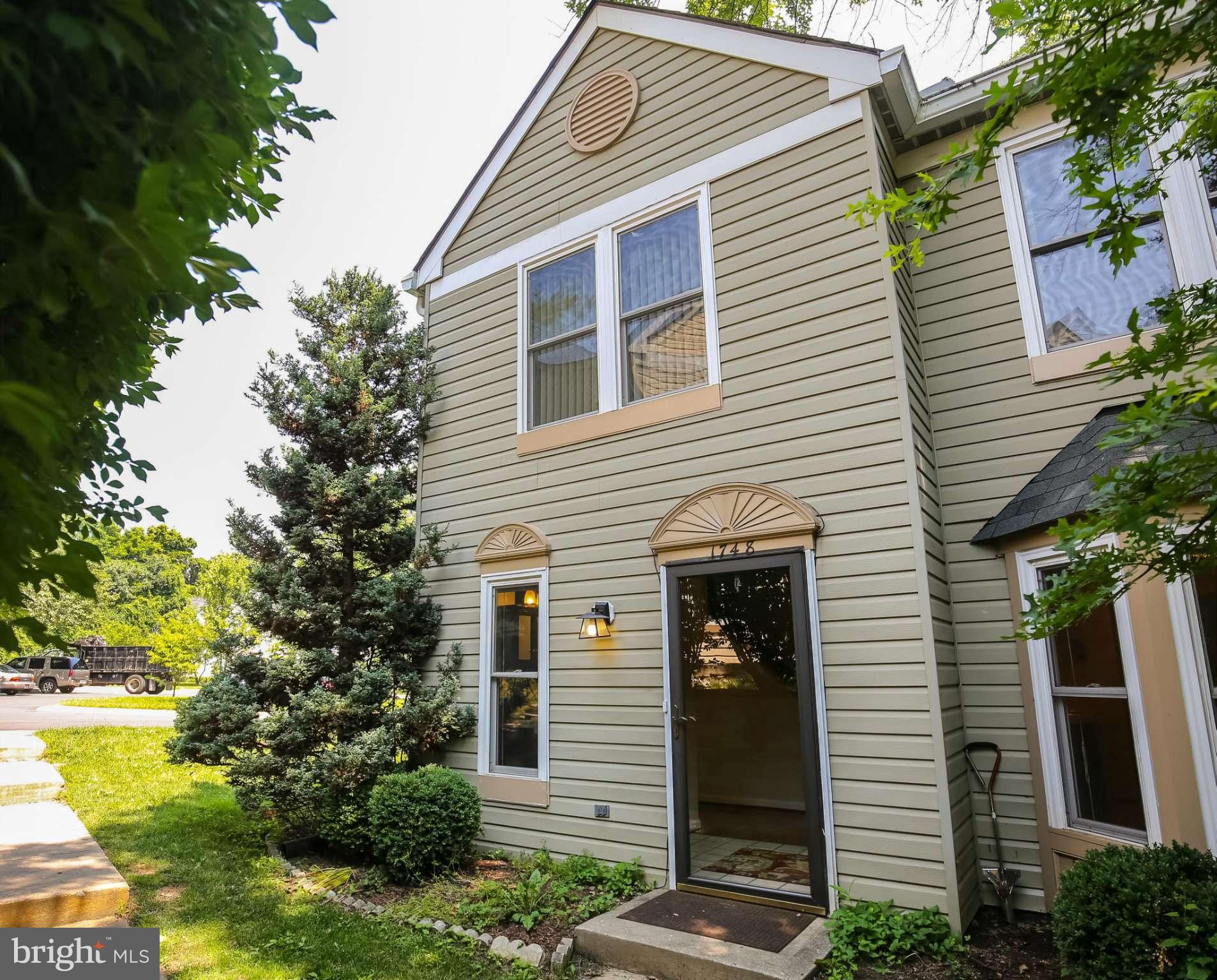 1748 Wilcox Lane Silver Spring, MD 20906 - Photo 1 of 19 a view of a house with a yard and potted plants