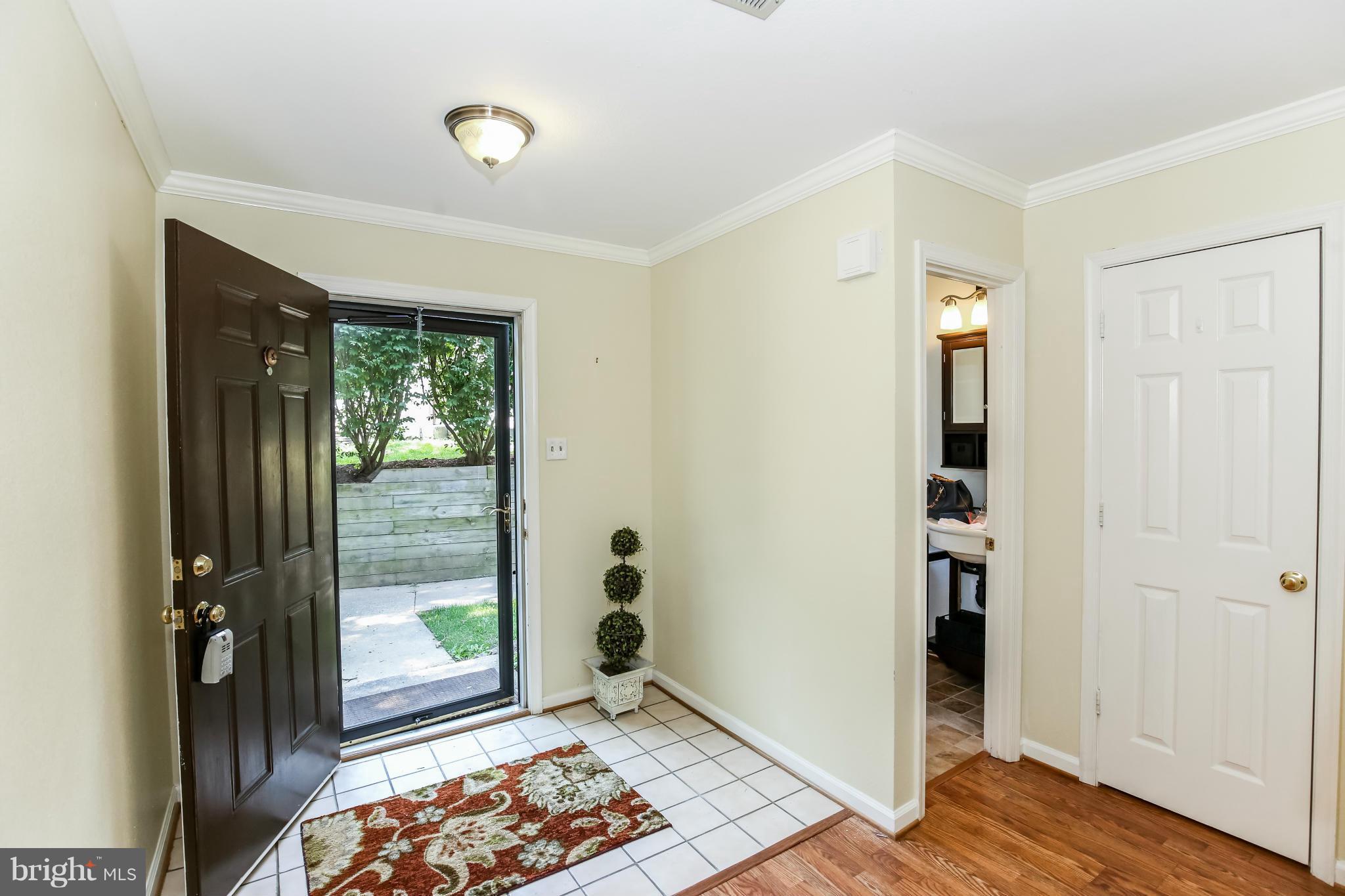1748 Wilcox Lane Silver Spring, MD 20906 - Photo 2 of 19 a view of an entryway with wooden floor
