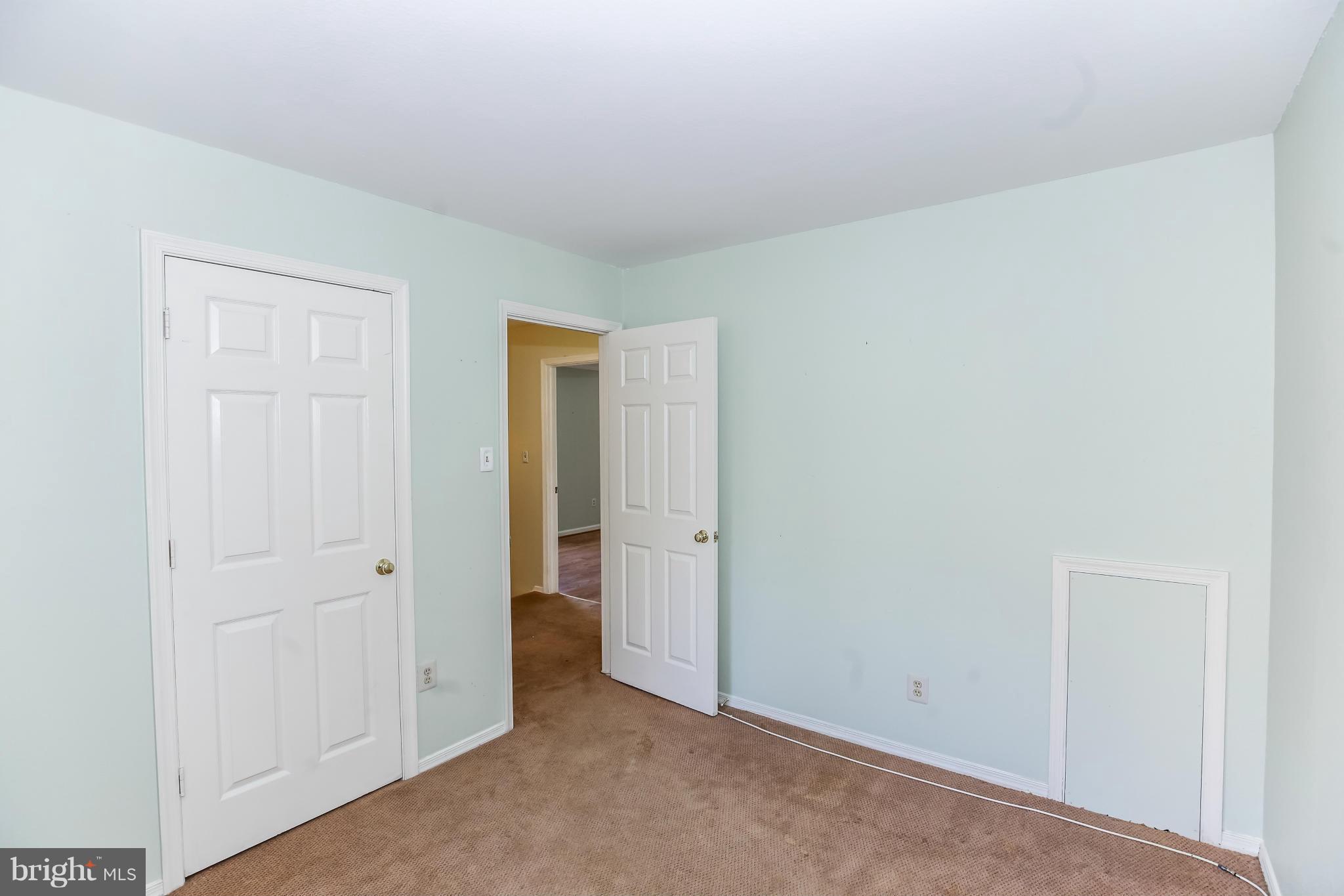1748 Wilcox Lane Silver Spring, MD 20906 - Photo 13 of 19 an empty room with closet area