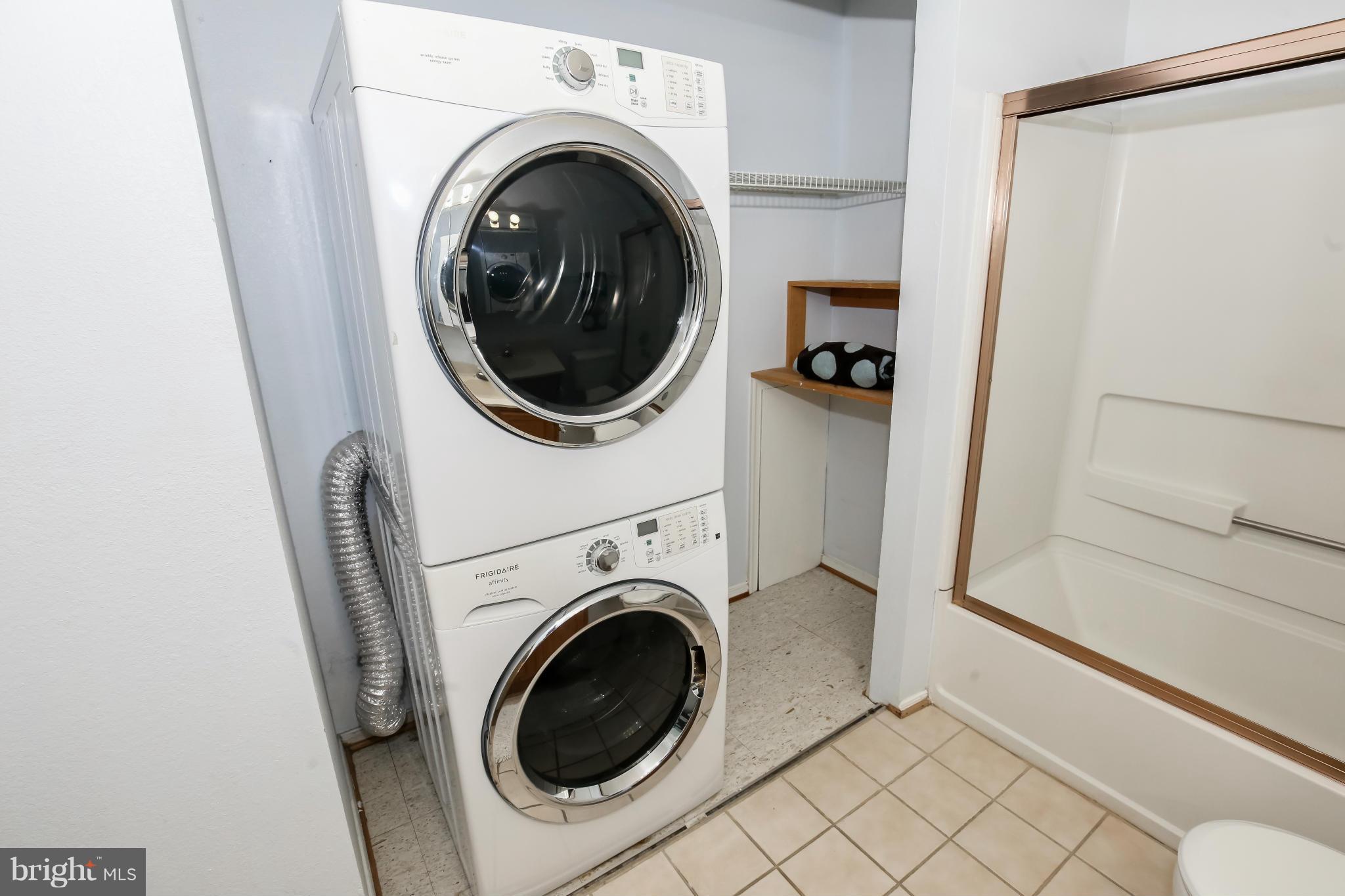 1748 Wilcox Lane Silver Spring, MD 20906 - Photo 15 of 19 a utility room with dryer and washer
