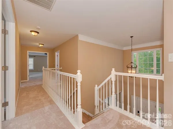a view of hallway with stairs