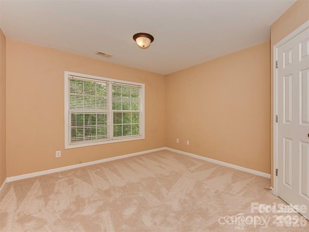 5607 Fulton Ridge Drive Indian Trail, NC 28079 - Photo 21 of 44 a view of an empty room with a window