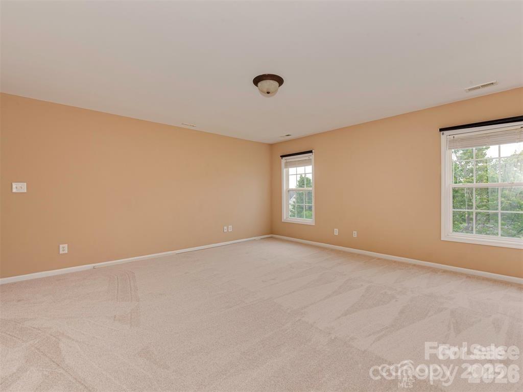 5607 Fulton Ridge Drive Indian Trail, NC 28079 - Photo 28 of 44 a view of an empty room with a window