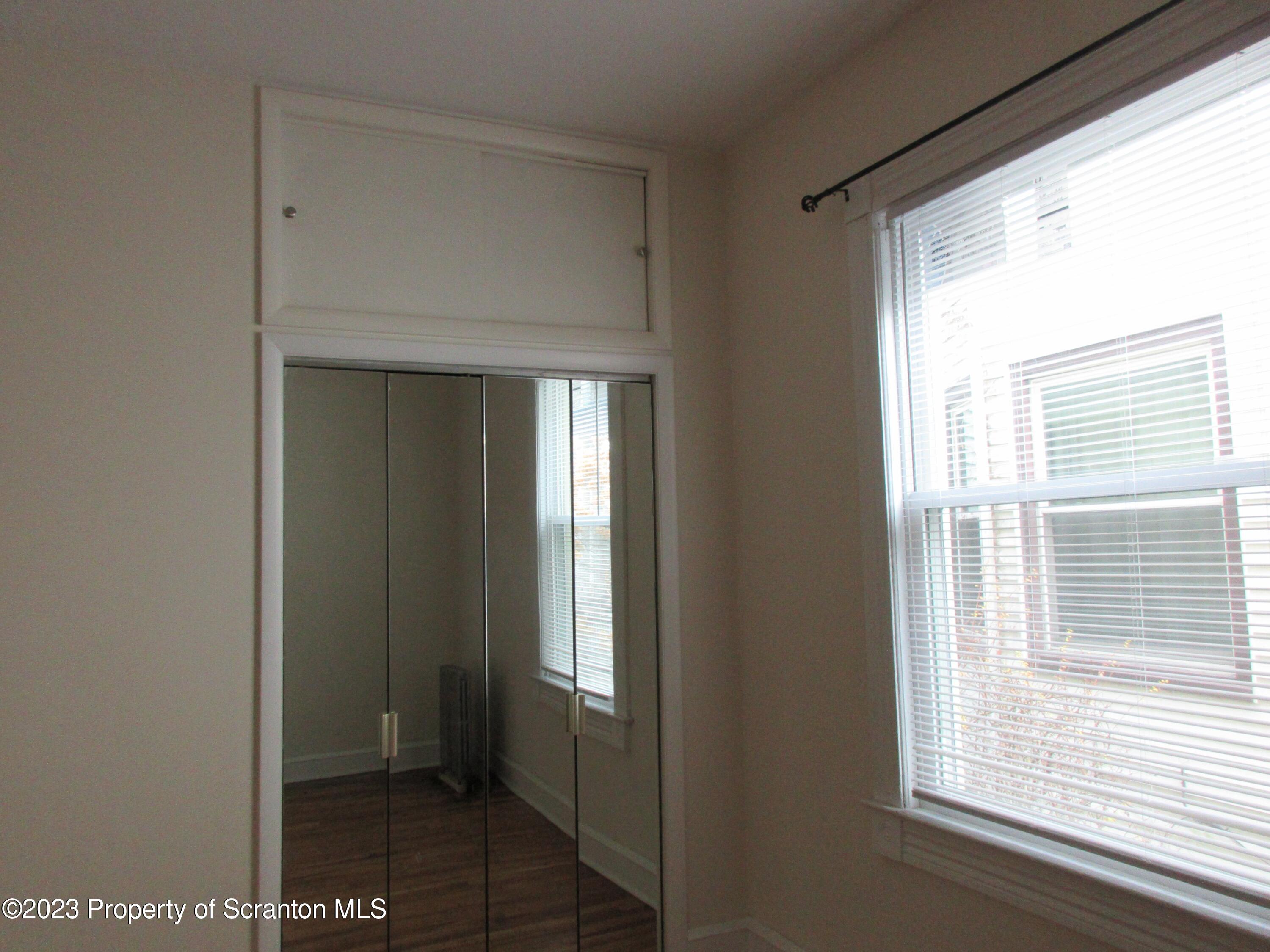 705 North Main Avenue Scranton, PA 18504 - Photo 17 of 25 a view of a bathroom with a window