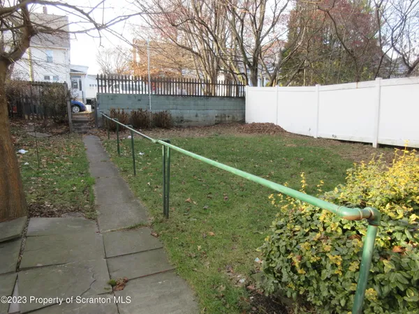 a view of a pathway of a yard