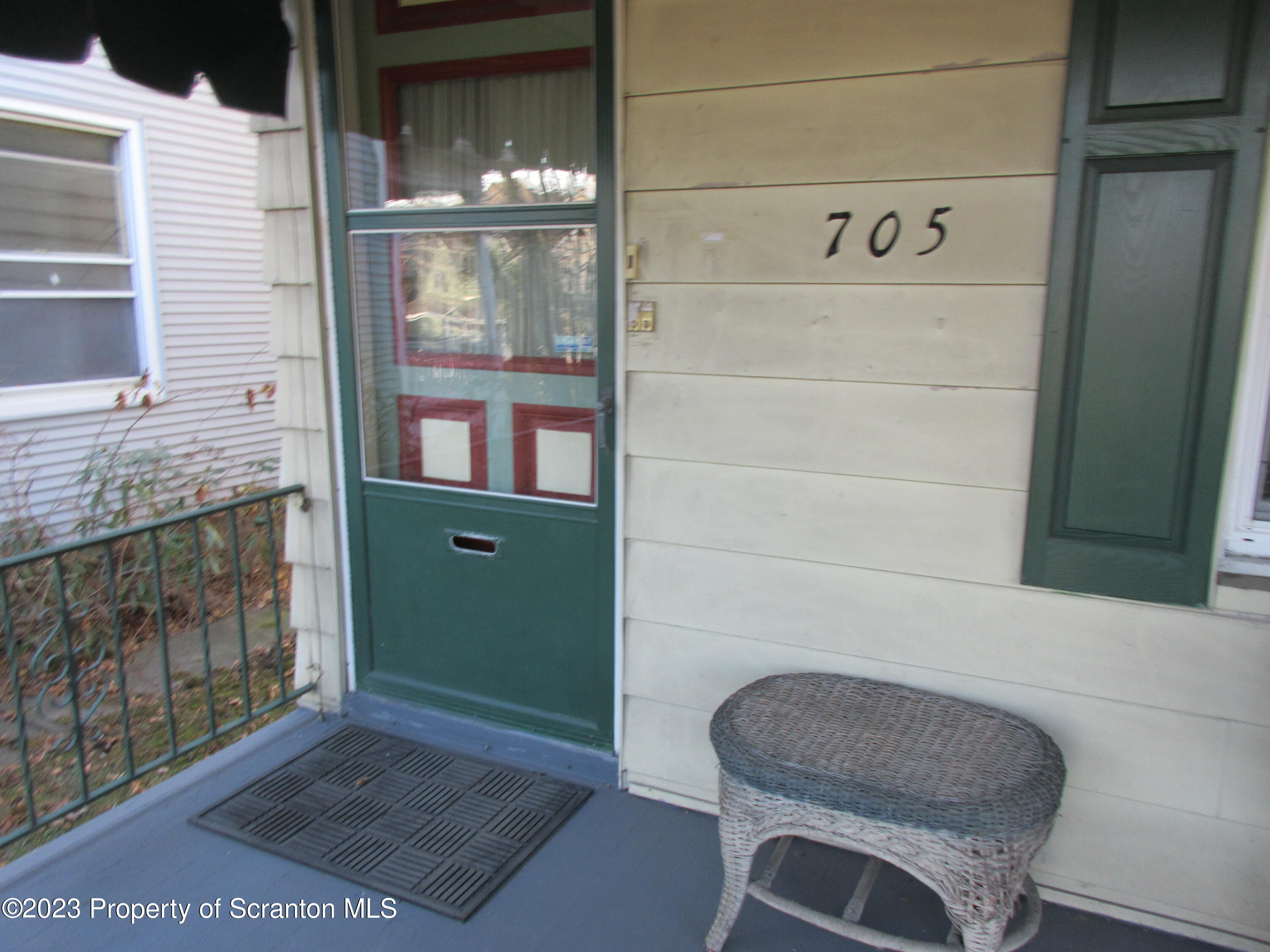 705 North Main Avenue Scranton, PA 18504 - Photo 4 of 25 a view of a door and chair in the balcony