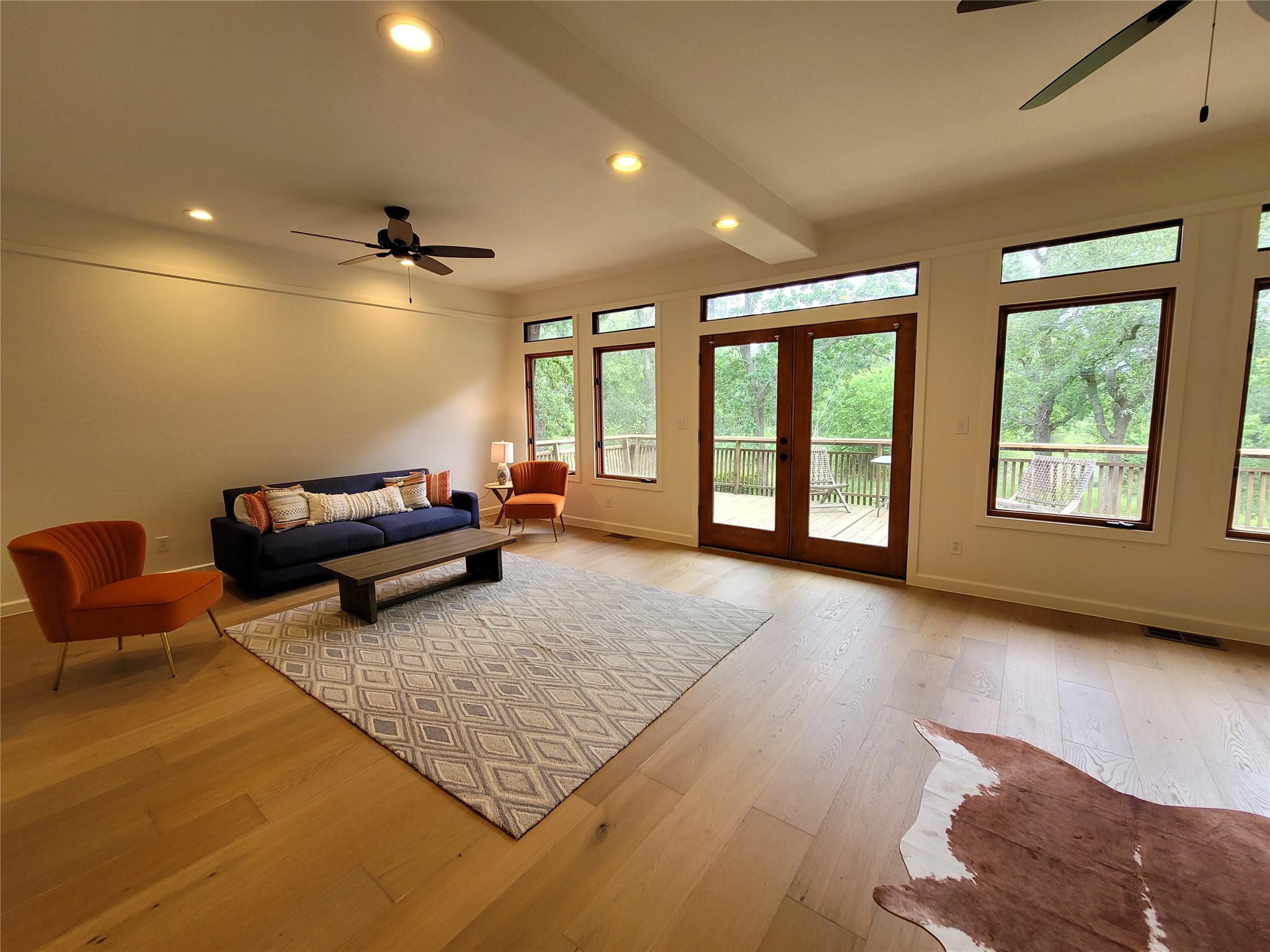 281 Earl Callahan Road, Unit A Cedar Creek, TX 78612 - Photo 2 of 39 a living room with furniture and a flat screen tv