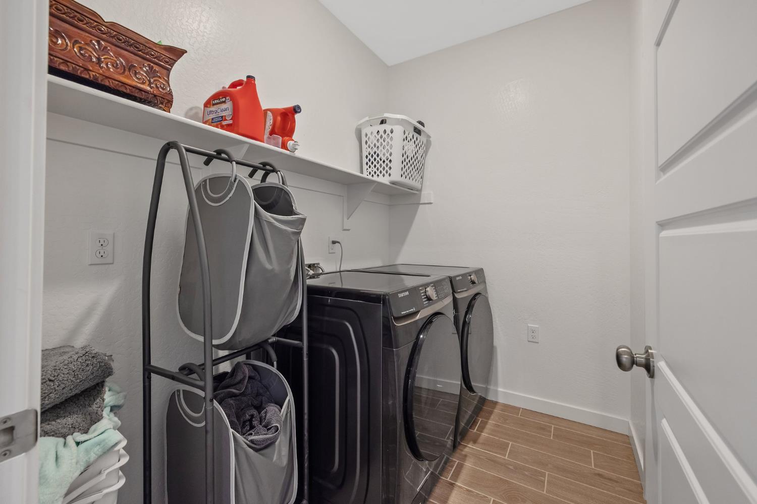 2409 Pepperdine Street Lemoore, CA 93245 - Photo 21 of 50 a view of walk in closet with clothes and shoes