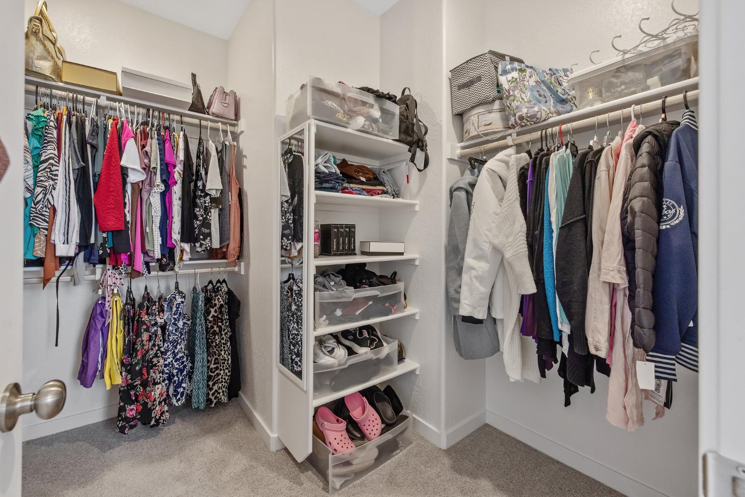 2409 Pepperdine Street Lemoore, CA 93245 - Photo 28 of 50 a view of walk in closet with clothes