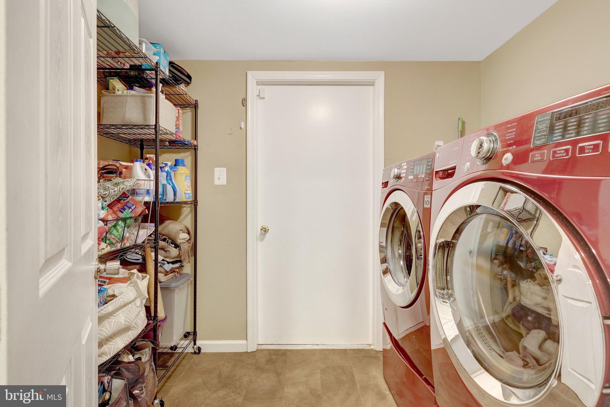1008 Moore Place Southwest Vienna, VA 22180 - Photo 23 of 55 a view of storage and utility room with washer and dryer