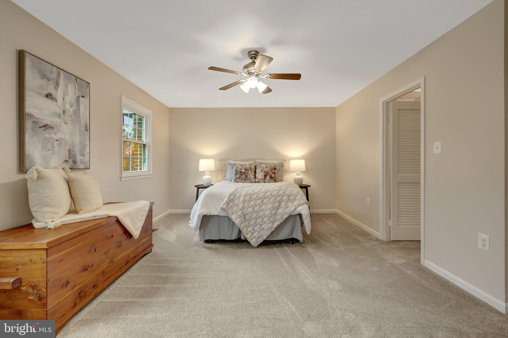1008 Moore Place Southwest Vienna, VA 22180 - Photo 28 of 55 a bedroom with a large bed and window