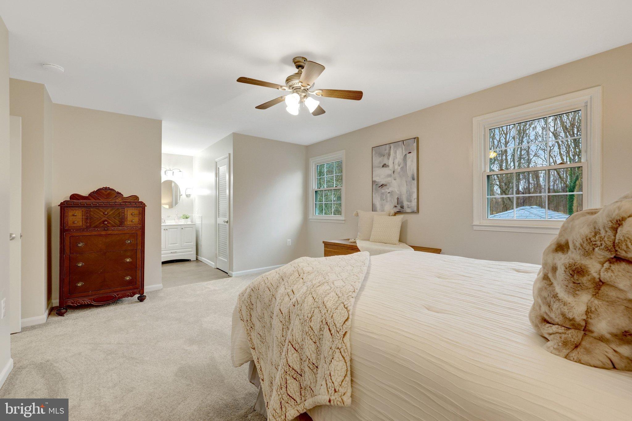 1008 Moore Place Southwest Vienna, VA 22180 - Photo 29 of 55 a bedroom with a bed and window